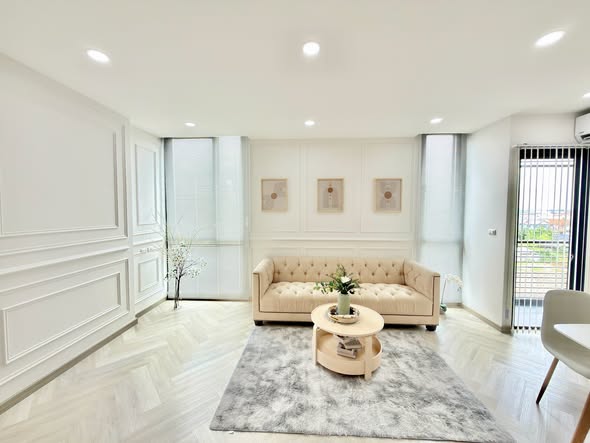 bedroom and living room of Apple Condominium