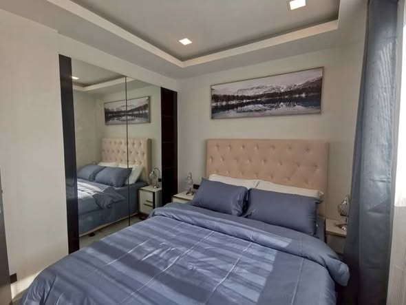 bedroom of Arcadia Millennium Tower