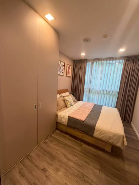 bedroom of Atmoz รัชดา-ห้วยขวาง คอนโด
