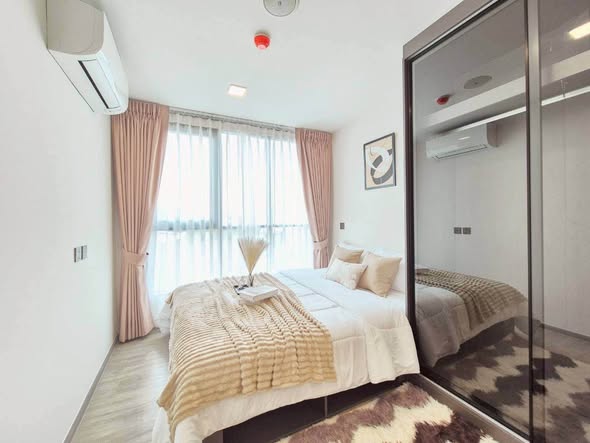 bedroom and room interior of Atmoz Palacio Ladprao Wanghin | แอทโมซ พาลาซิโอ ลาดพร้าว วังหิน