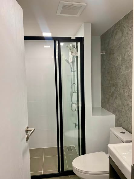 room interior and bathroom of Atmoz Tropicana Bangna
