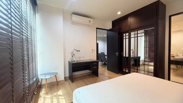 bedroom and room interior of Baan Klang Krung Siam-Pathum Wan