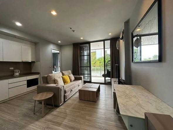 living room and kitchen of Baan Plai Haad Pattaya