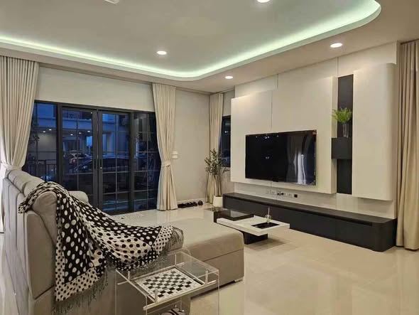 bedroom and living room of Centro Bangna