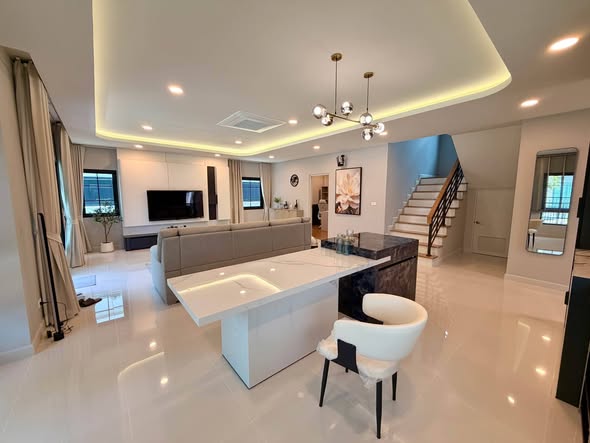 living room and kitchen of Centro Bangna