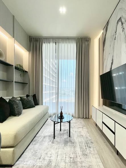 bedroom and living room of Chapter Charoennakhon–Riverside