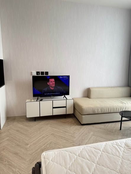 living room and bedroom of Chapter Charoennakhon–Riverside