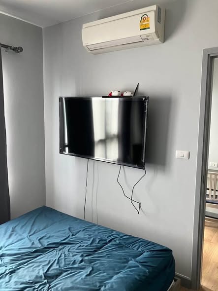 bedroom and bathroom of Chapter One Midtown Lat Phrao 24
