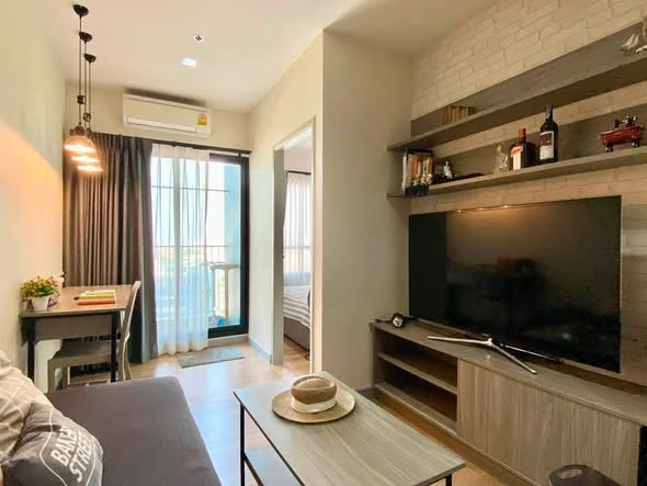 living room and bedroom of Chapter One Midtown Lat Phrao 24