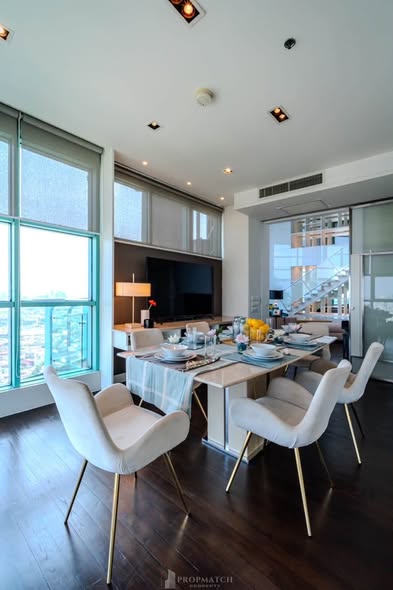 living room and room interior of Chatrium Hotel Riverside Bangkok