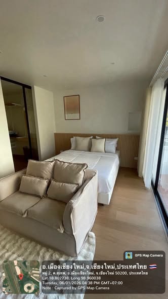 bedroom and living room of Chomdoi Condotel—2