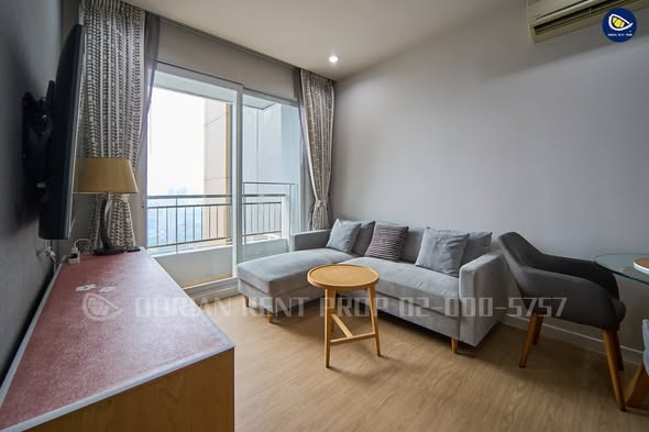 bedroom and living room of Circle Condominium