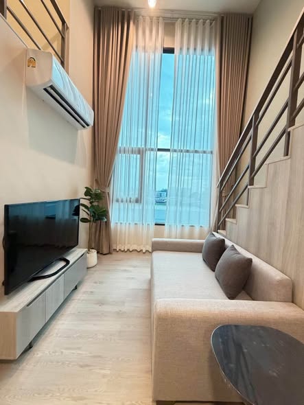 living room and bedroom of COBE Kaset-Sripatum (โค้บบ์ เกษตร-ศรีปทุม)