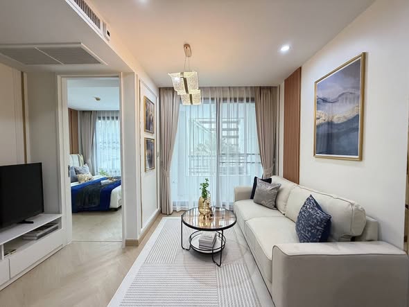 living room and bedroom of Collezio Sathon-Pipat