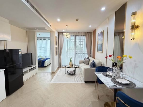 living room and bedroom of Collezio Sathon-Pipat