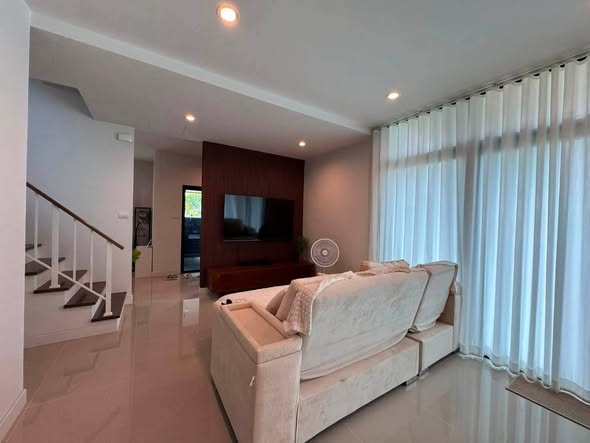 living room and bedroom of Como Botanica ii