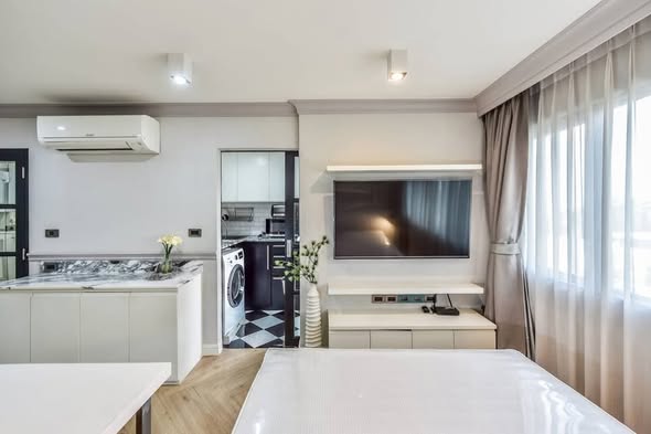 living room and kitchen of Condo One Sathon