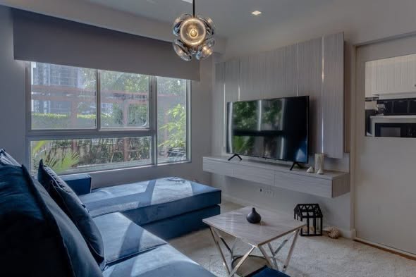 living room and room interior of Condo One X