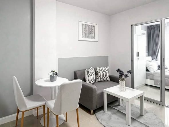 bedroom and living room of Condo The Cache Rama 3 – Samrong