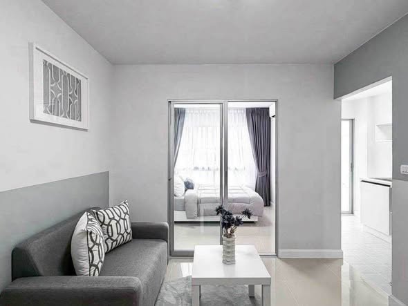 bedroom and living room of Condo The Cache Rama 3 – Samrong