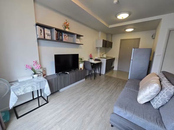 bedroom and living room of D Condo Rattanathibet