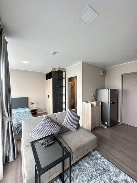 bedroom and living room of dcondo Campus Hideaway