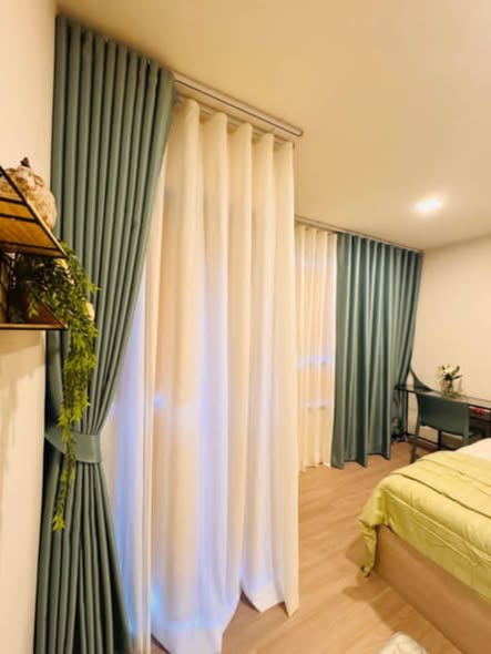 bedroom of dcondo Reef Phuket