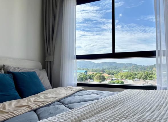 bedroom of dcondo Reef Phuket