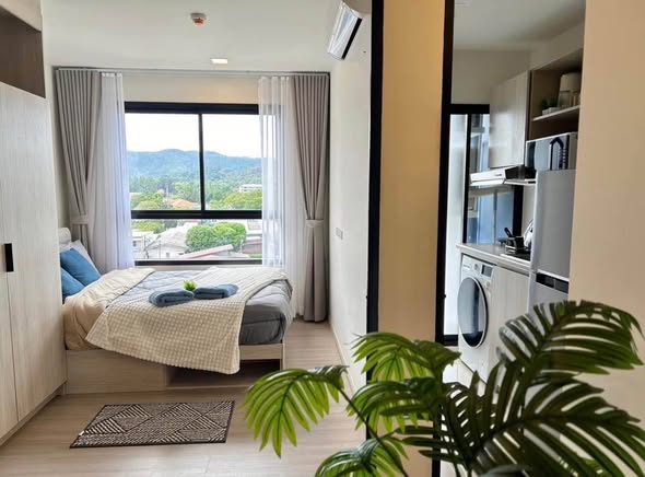 bedroom and room interior of dcondo Reef Phuket