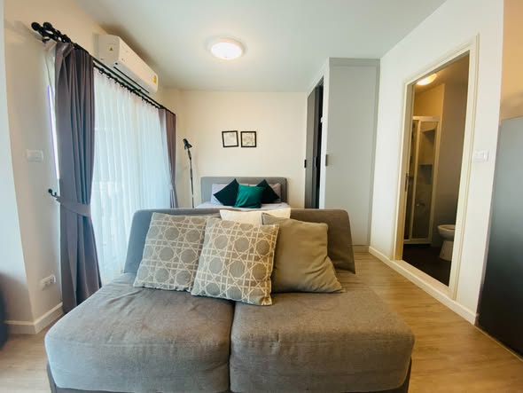 bedroom and living room of dcondo rin