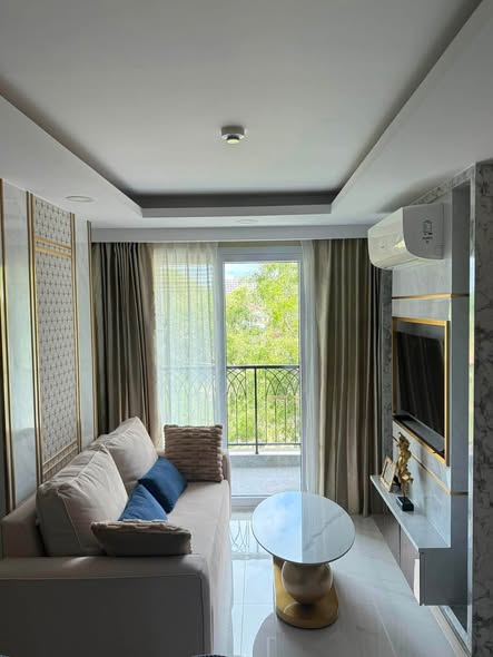 living room and bedroom of Dusit Grand Park