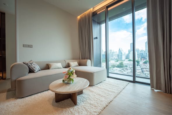 bedroom and living room of EI8HTEEN SEVEN