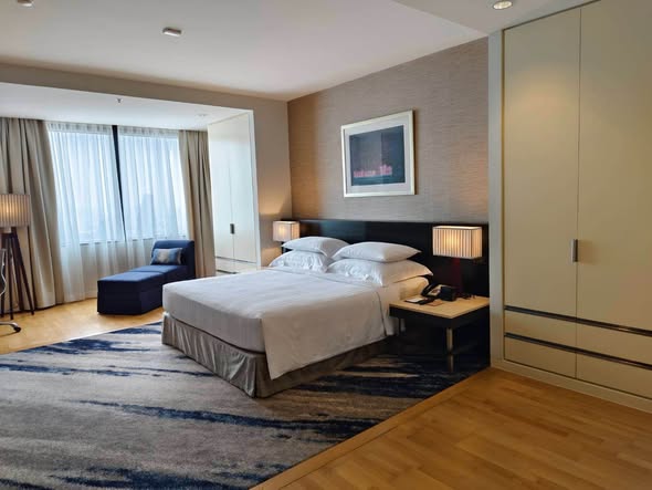 bedroom of Emporium Suites by Chatrium