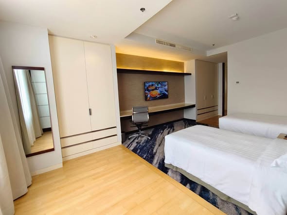 bedroom of Emporium Suites by Chatrium