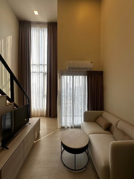 living room and bedroom of FLO by Sansiri