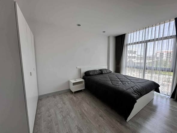 bedroom of G HAUS Condominium Santikham 4