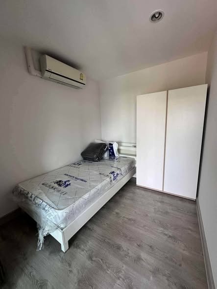 bedroom of G HAUS Condominium Santikham 4