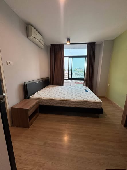 bedroom of G HAUS Condominium Santikham 4