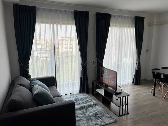 living room and bedroom of G HAUS Condominium Santikham 4