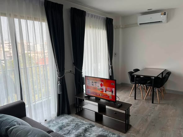 living room and bedroom of G HAUS Condominium Santikham 4