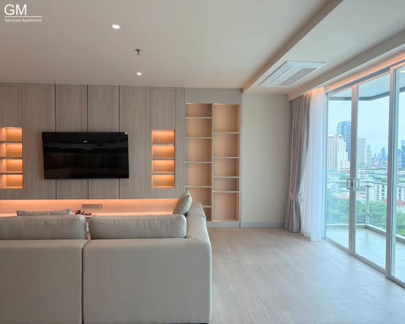 living room and bedroom of GM Service Apartment