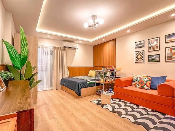 bedroom and living room of Happy Condo