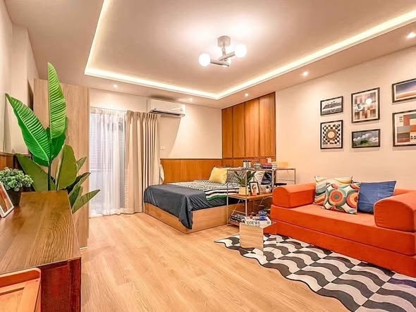 bedroom and living room of Happy Condo Rachada 18