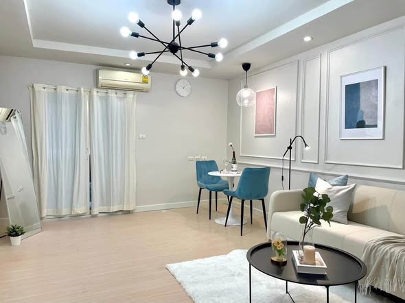 bedroom and living room of Happy Condo Rachada 18