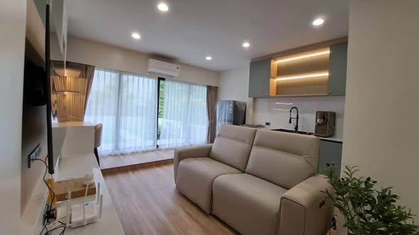 bedroom and living room of HOLME Ekkamai 22