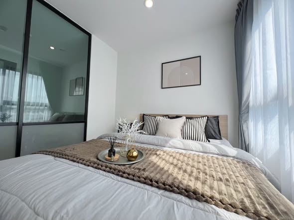 bedroom and room interior of iCondo Activ Pattanakarn