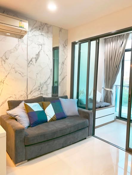 living room and bedroom of Ideo BluCove Sukhumvit