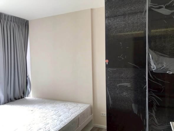 bedroom and room interior of IKON SUKHUMVIT 77 CONDOMINIUM