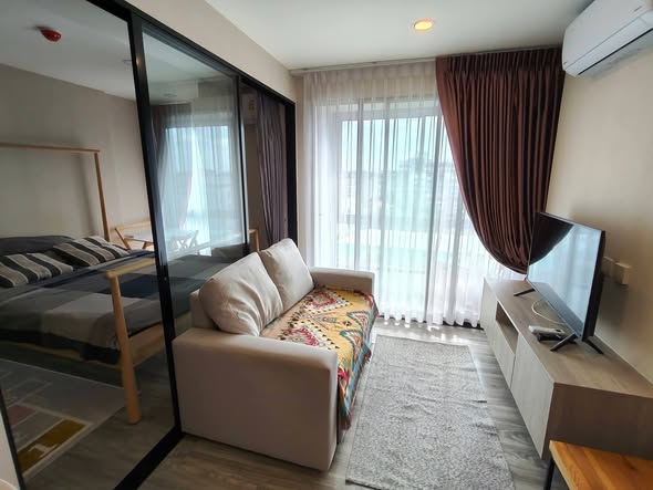 living room and bedroom of IKON SUKHUMVIT 77 CONDOMINIUM