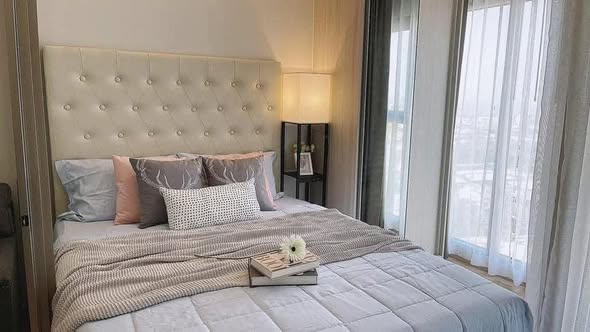 bedroom of Infinity One Condo
